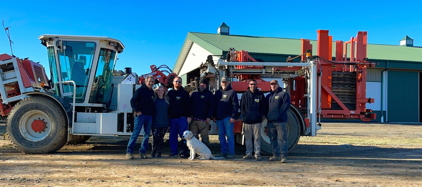 Our Team with a Sod Harvester